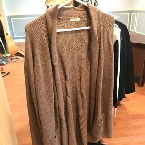 light brown slouchy sweater with pockets
